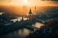 Big Ben Clock Tower in London on sunset. Westminster Bridge in London city aerial view.