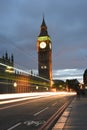 Big Ben or Great Clock Tower or Palace of Westminster or UK Parliament at night hours with light trails of buses, cars