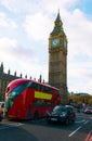 The Big Ben, the House of Parliament and the Westminster Bridge and red bus Royalty Free Stock Photo