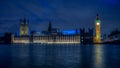 Big Ben and Houses of Parliament at dusk from the bank of river Thames, London, UK Royalty Free Stock Photo