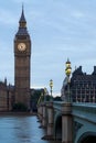 Big Ben and illuminated bridge in the early morning in London Royalty Free Stock Photo