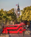 Big Ben with red buses in London, England, UK Royalty Free Stock Photo