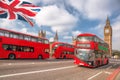 Big Ben with red buses in London, England, UK Royalty Free Stock Photo