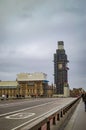 Big ben repair and westminster bridge with road leading to parliament building Royalty Free Stock Photo