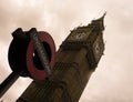 Big Ben tower and the sign of the London Underground against a cloudy sky Royalty Free Stock Photo