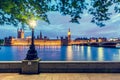 Big Ben, Westminster Bridge on River Thames in London, England, UK at night Royalty Free Stock Photo