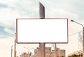 Big billboard mockup on city background with apartment building. Outdoor advertising poster. Royalty Free Stock Photo