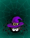 Big Black cute spider in violet witch hat hanging on cobweb on dark green background. Halloween scary funny object Royalty Free Stock Photo