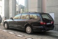 Big black old veteran car Mitsubishi Galant eighth generation hatchback parked Royalty Free Stock Photo