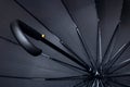 Big black umbrella bottom view close up Royalty Free Stock Photo