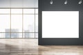 Big blank white illuminated billboard with space for your advertisement on black wall in sunlit empty hall with wooden floor and Royalty Free Stock Photo