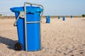 Big blue dust bins at the beach Royalty Free Stock Photo