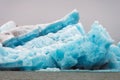 Big and blue icebergs floating around in the atlantic ocean near Greenland.