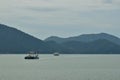 Big Blue Passenger Ferry Boat goes on the sea near Trad Island Royalty Free Stock Photo