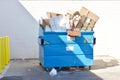 Recycle dumpster bin with all types of recyclable materials Royalty Free Stock Photo