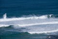 Big blue wave breaks in a dark blue turquoise ocean Royalty Free Stock Photo
