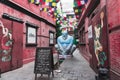 Big blue Yeti statue in Thamel neighborhood with prayer flags