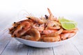 Big boiled shrimps in white plate