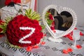 Big bouquet of one hundred big red roses flowers .white heart mirror. A bouquet of flowers bouquet of a hundred red roses