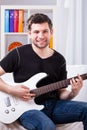 Big boy with his electric guitar Royalty Free Stock Photo