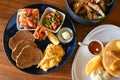 Big breakfast, pancake and salad