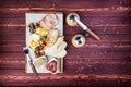 Big breakfast. Ham, bread toast, fried eggs, grilled mushrooms and tomatoes with sauce. There is a pepper grinder and Royalty Free Stock Photo