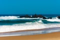 Big breaking Ocean wave on a sandy beach Royalty Free Stock Photo