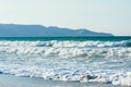 Big breaking ocean wave on a sandy beach. Grete Royalty Free Stock Photo