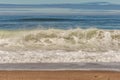 Big breaking Ocean wave on a sandy beach on the north shore of Oahu Hawaii Royalty Free Stock Photo