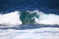 Big breaking ocean wave on a sandy beach Royalty Free Stock Photo