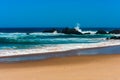 Big breaking Ocean wave on a sandy beach Royalty Free Stock Photo