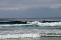 Big breaking wave with glowing green water and big white spray and foam filling the frame. Image taken in Bali. Big large surfing Royalty Free Stock Photo