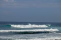 Big breaking wave with glowing green water and big white spray and foam filling the frame. Image taken in Bali. Big large surfing Royalty Free Stock Photo