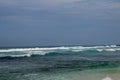 Big breaking wave with glowing green water and big white spray and foam filling the frame. Image taken in Bali. Big large surfing Royalty Free Stock Photo