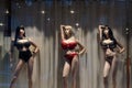 Big breast plastic female mannequins in underwear at night showcase. Women clothes fashion store mannequin wearing Royalty Free Stock Photo