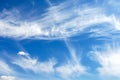 Big bright unusual beautiful sky with white creative clouds. Blue sky with unusual cumulus fluffy clouds as a natural background