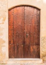 Big brown rustic wood entry door Royalty Free Stock Photo