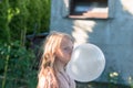 Big bubble from chewing gum and child Royalty Free Stock Photo