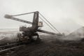 Big bucket wheel excavator on a walking-rail track at work Royalty Free Stock Photo