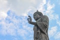 Big Buddha statue ancient on blue sky background