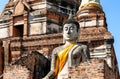 Big Buddha statue in front of temple Wat Yai Chai Mongkol (or Mongkhon) in Ayutthaya, Thailand Royalty Free Stock Photo