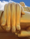 big buddha statue hand and blue sky