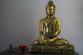 Big Buddha statue, Incense stick burning in incense burner and candle with lotus flower shape Royalty Free Stock Photo