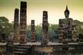 Big buddha statue inside ruin temple at Sukhothai Historical Par