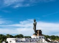 Big Buddha statue under blue sky in Thailand