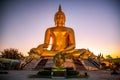 Big Buddha during sunset at Wat Muang in Ang Thong, Thailand