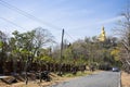 Big buddha on top of mountain for thai people travelers travel visit and trail trekking go to respect praying blessing wish holy