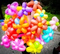 Big bunch of colorful balloons in form of flowers on the streetmarket