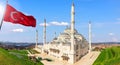 Big Camlica Mosque and the Turkish flag, Istanbul, Turkey Royalty Free Stock Photo