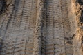 Big car wheel trace on road, puddle and mud Royalty Free Stock Photo